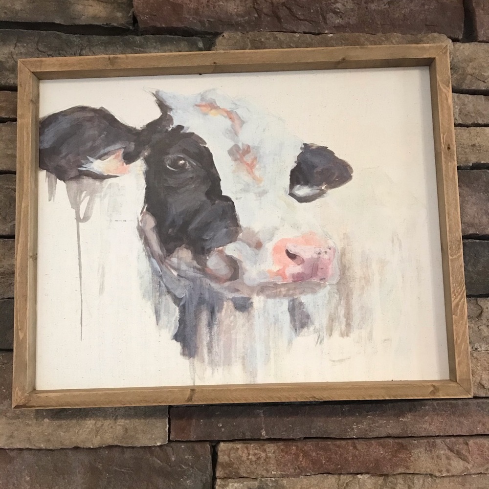 Framed cow painting